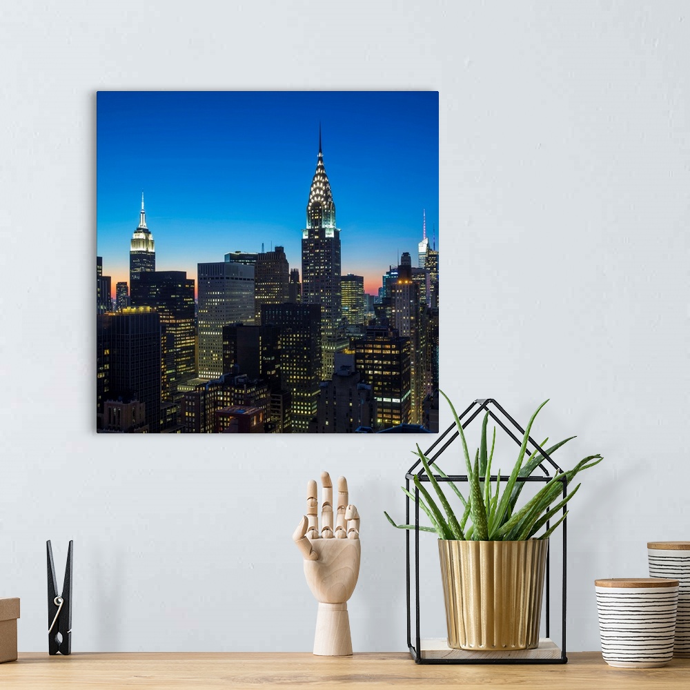 A bohemian room featuring Chrysler Building and Empire State Building, Midtown Manhattan, New York City, New York, USA.