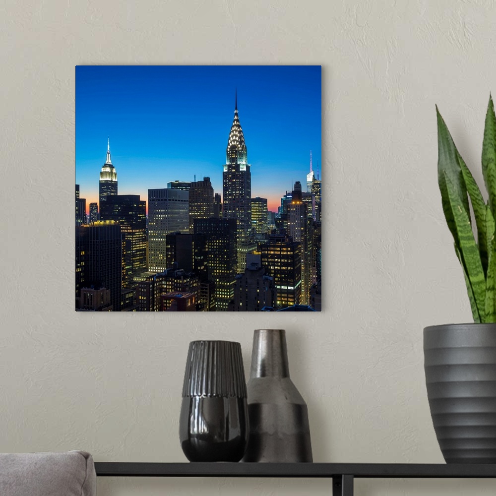 A modern room featuring Chrysler Building and Empire State Building, Midtown Manhattan, New York City, New York, USA.