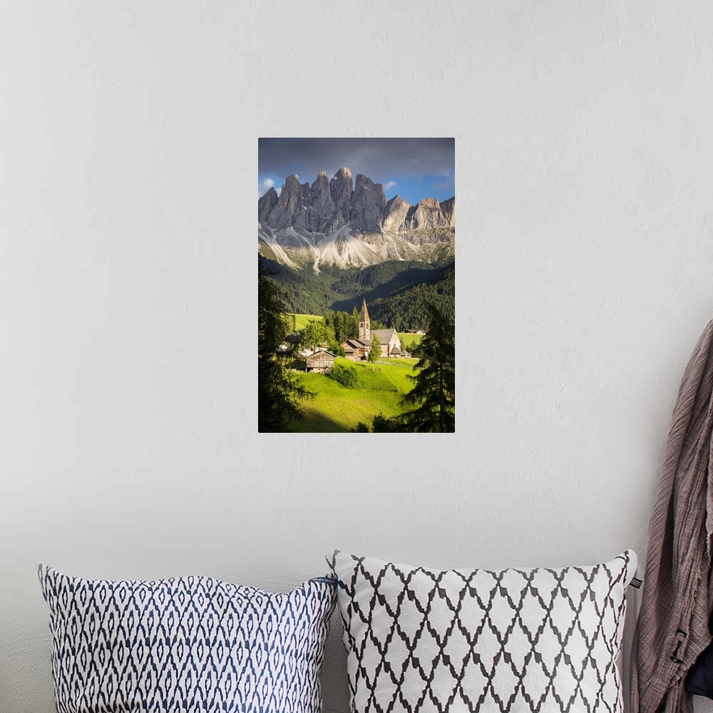 A bohemian room featuring the famous church in S. Maddalena in Villnoss with the Geisler in the background, Bolzano provinc...
