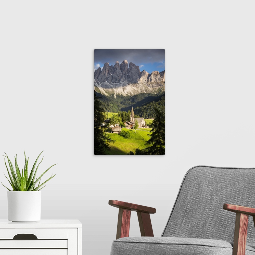 A modern room featuring the famous church in S. Maddalena in Villnoss with the Geisler in the background, Bolzano provinc...
