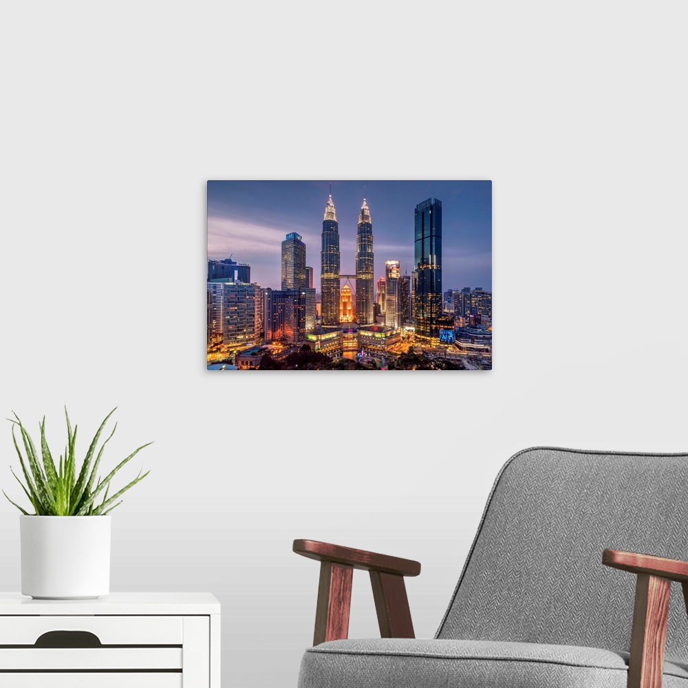 A modern room featuring City skyline at dusk, Kuala Lumpur, Malaysia.
