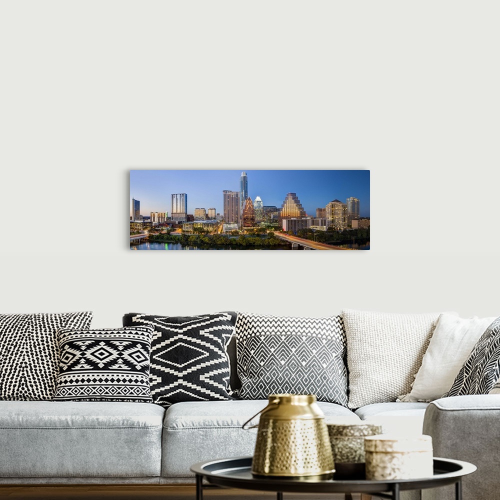 A bohemian room featuring City skyline viewed across the Colorado river, Austin, Texas, United States of America