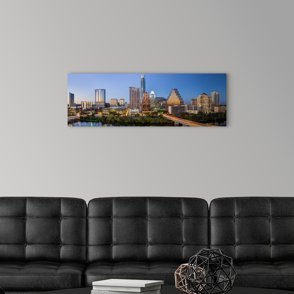 A modern room featuring City skyline viewed across the Colorado river, Austin, Texas, United States of America