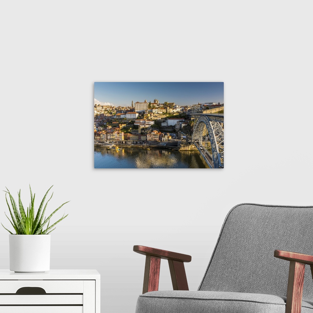 A modern room featuring City skyline with Douro river and Dom Luis I bridge, Porto, Portugal.