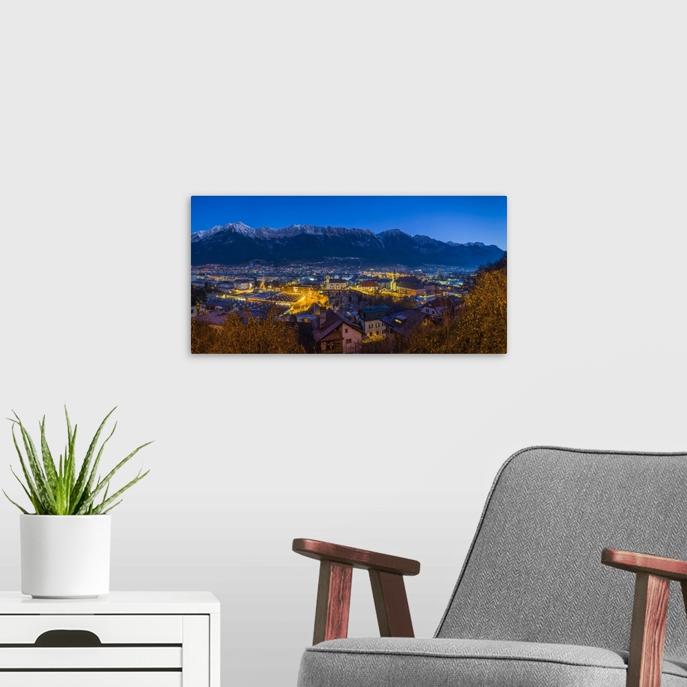A modern room featuring Austria, Tyrol,  Innsbruck, elevated city view with the Wilten Basilica and Wilten Abbey Church, ...