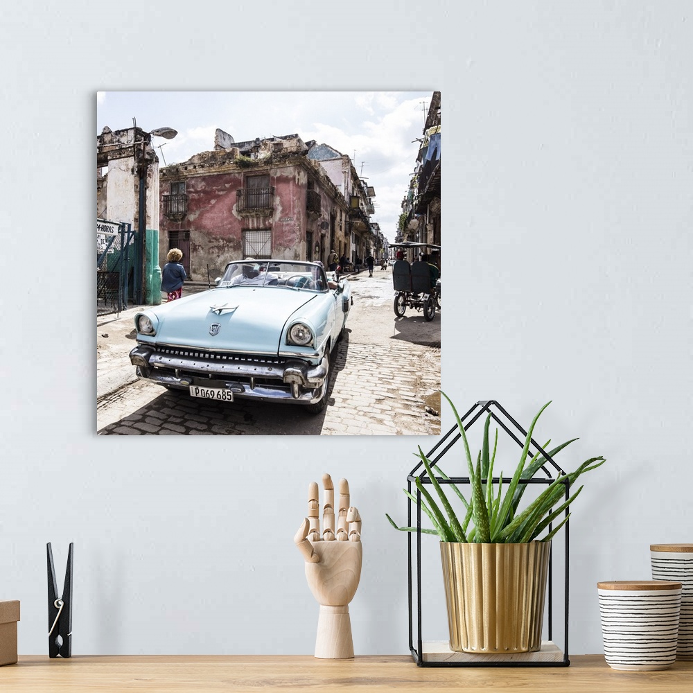 A bohemian room featuring Classic American car , Habana Vieja, Havana, Cuba.