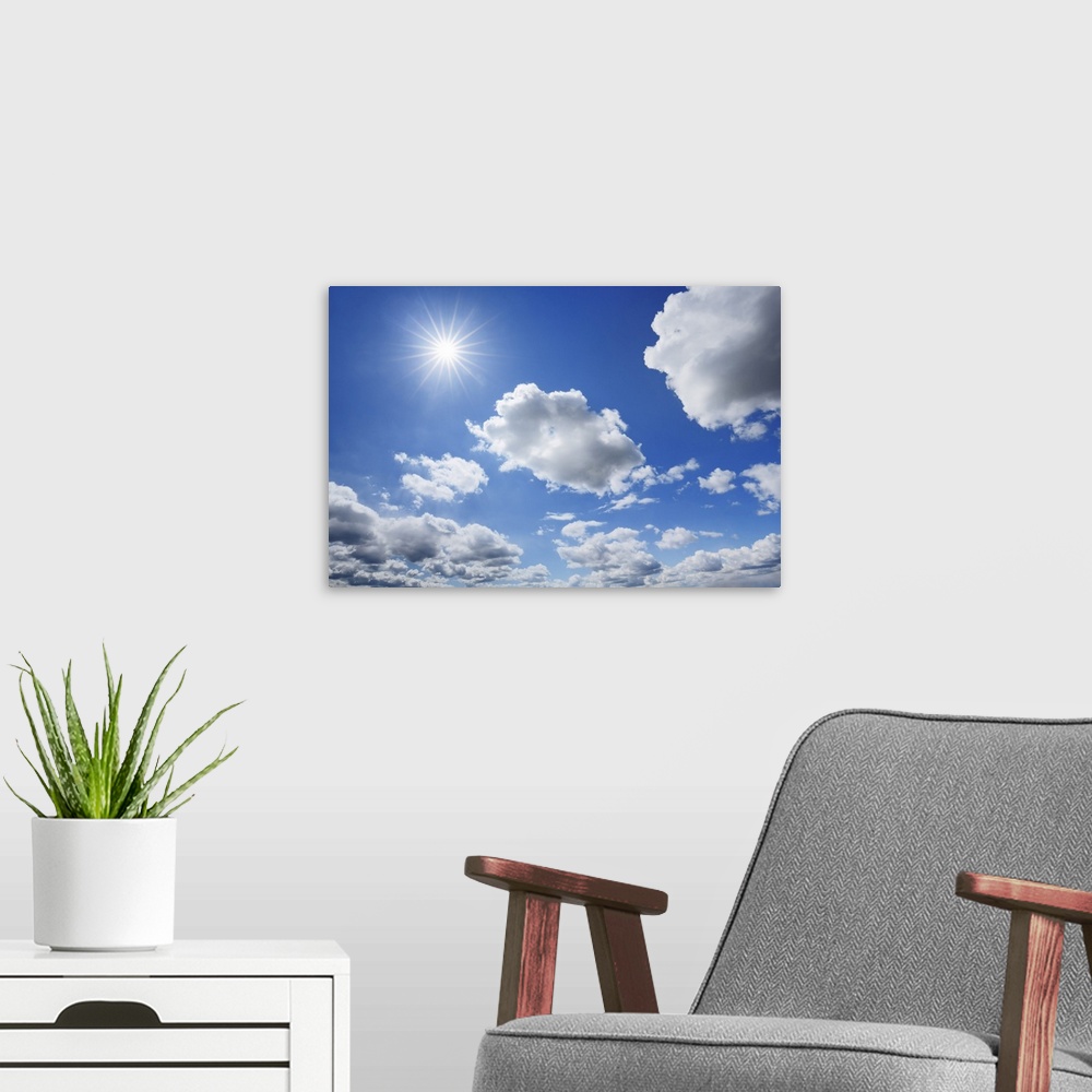 A modern room featuring Cloud impression with sun. Germany, Bavaria, Upper Bavaria, Freising, Giggenhausen. Bavaria, West...