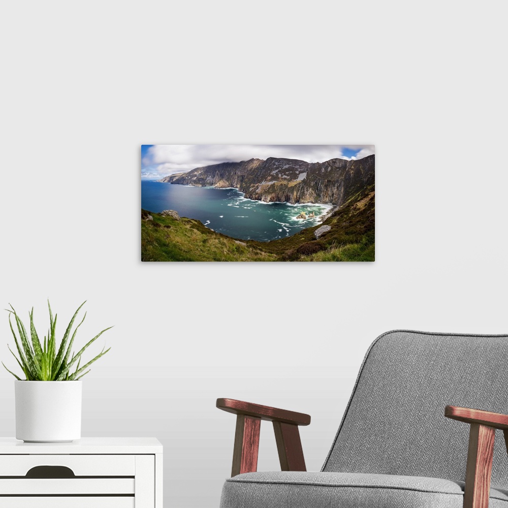A modern room featuring Clouds rushing over Slieve League, Ulster, Donegal, Ireland, Northern Europe.