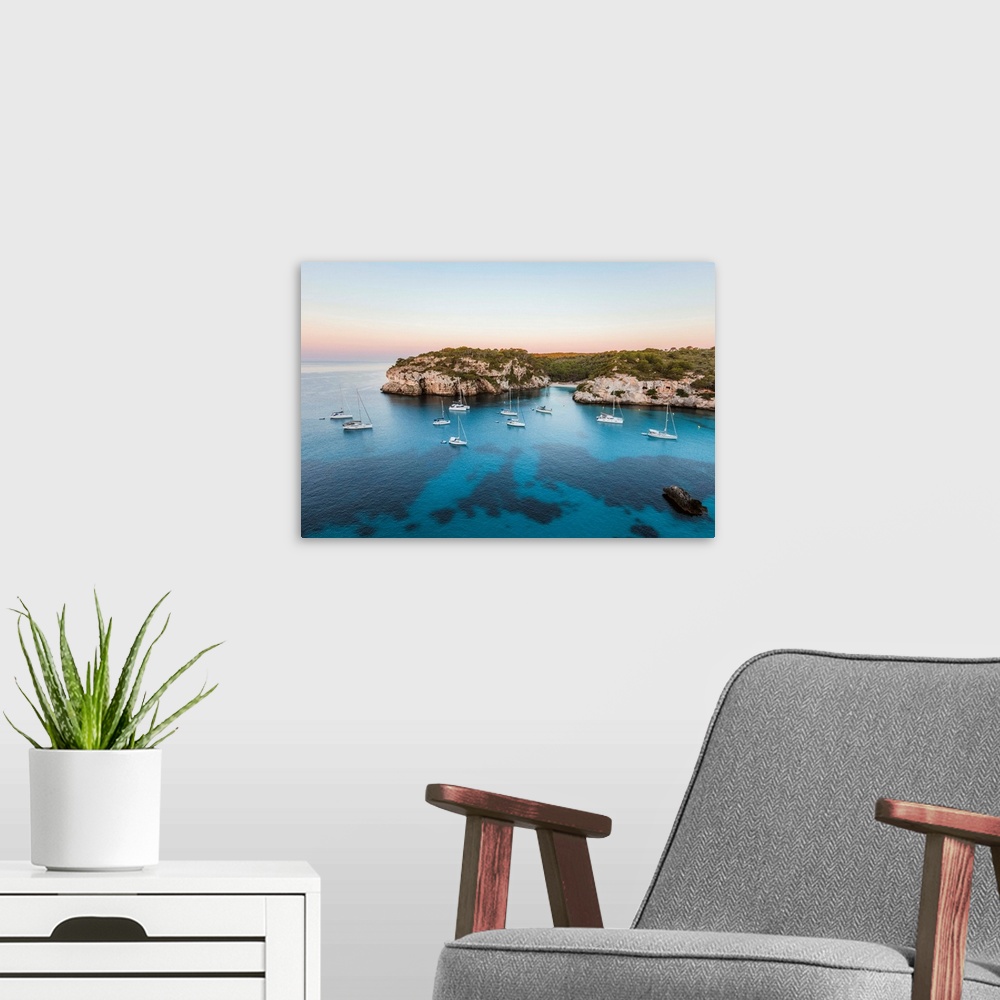 A modern room featuring Coastline at sunrise, Punta Macarella, Cala Macarella, Menorca, Balearic Islands, Spain.