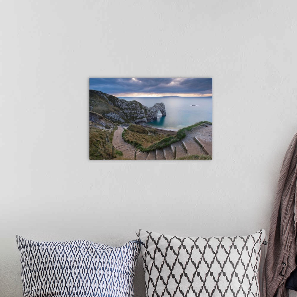 A bohemian room featuring Winding coastpath steps leading down to Durdle Door on the Jurassic Coast, Dorset, England. Autum...