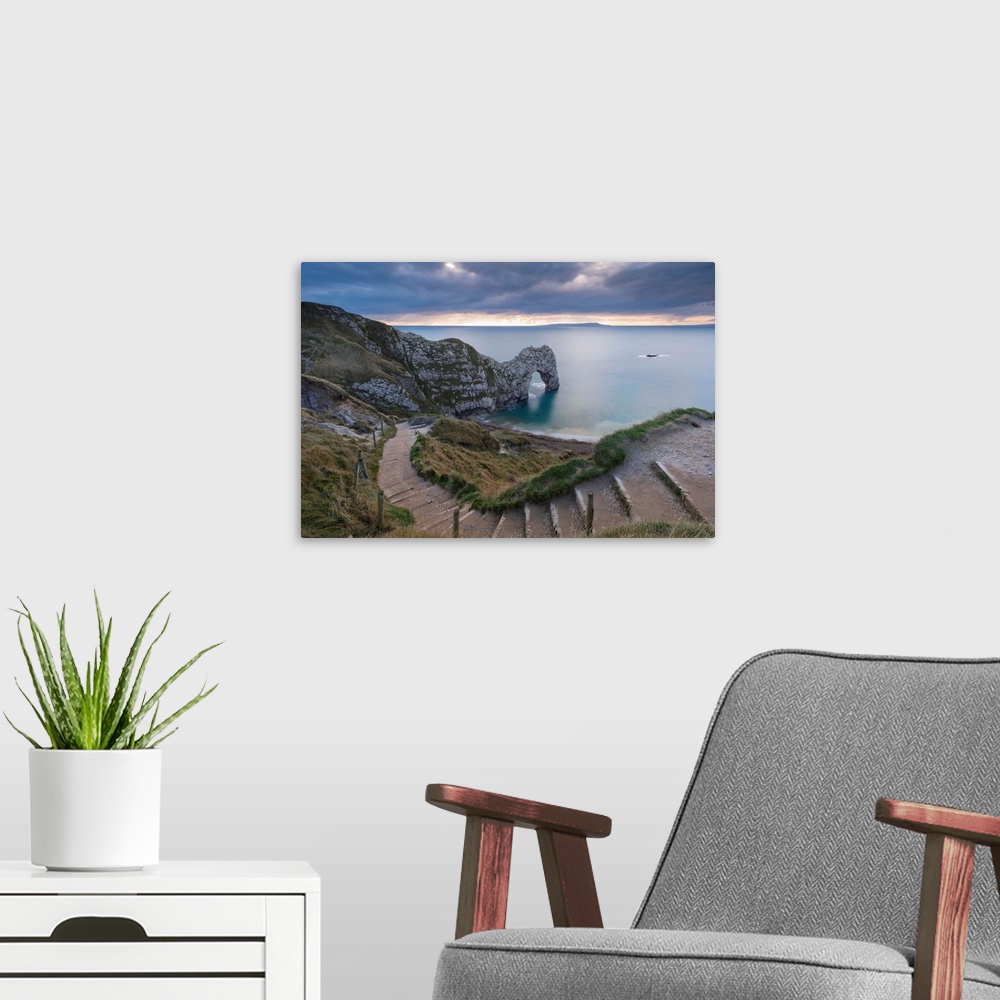 A modern room featuring Winding coastpath steps leading down to Durdle Door on the Jurassic Coast, Dorset, England. Autum...