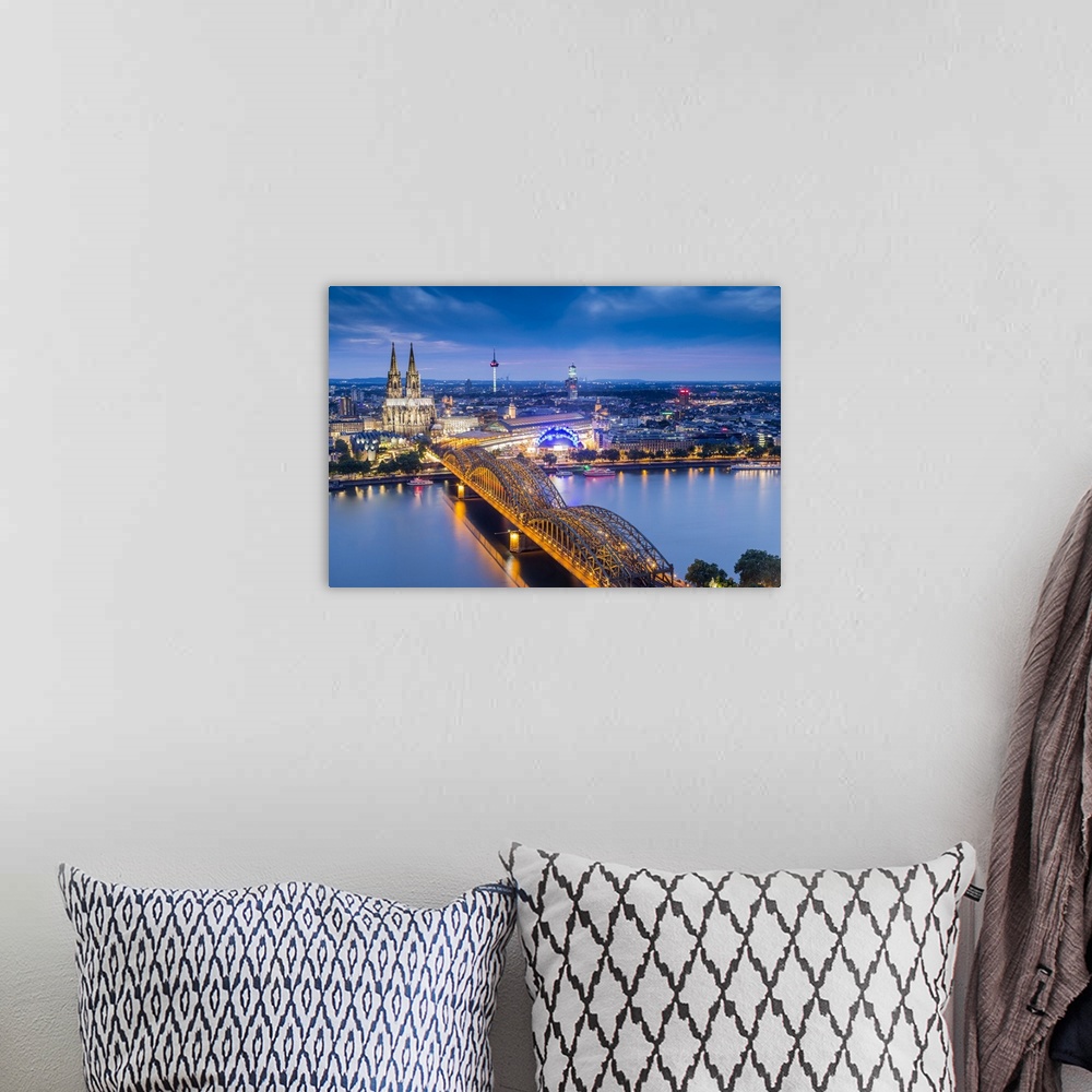 A bohemian room featuring Cologne Cathedral, River Rhine and Hohenzollern Bridge, Cologne, North Rhine Westphalia, Germany.