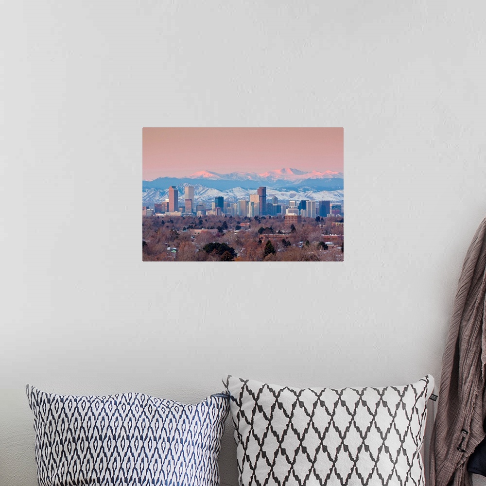 A bohemian room featuring USA, Colorado, Denver, city view and Rocky Mountains from the east, dawn