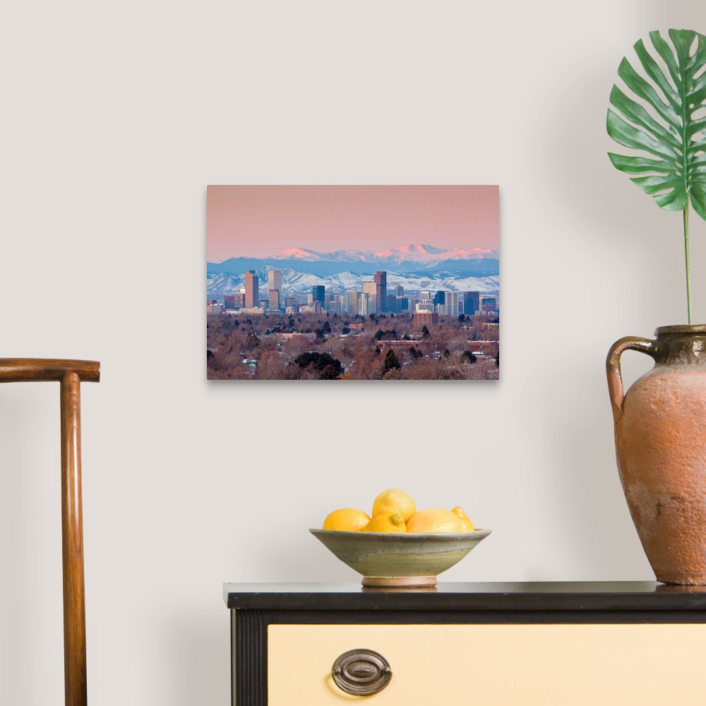 A traditional room featuring USA, Colorado, Denver, city view and Rocky Mountains from the east, dawn