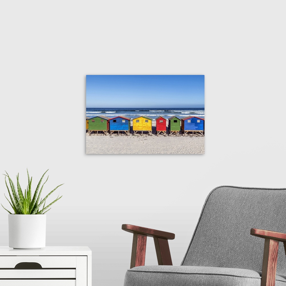 A modern room featuring Colorful beach houses on the beach, Muizenberg, Cape Town, Western Cape, South Africa.