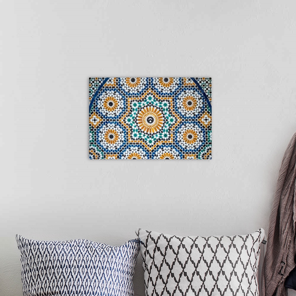 A bohemian room featuring Morocco, Marrakech-Safi (Marrakesh-Tensift-El Haouz) region, Marrakesh. Colorful tiled mosaic at ...