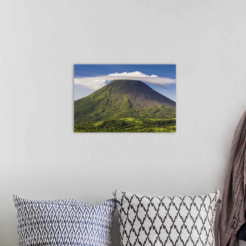 A bohemian room featuring Costa Rica, Alajuela, La Fortuna. The Arenal Volcano. Although classed as active the volcano has ...