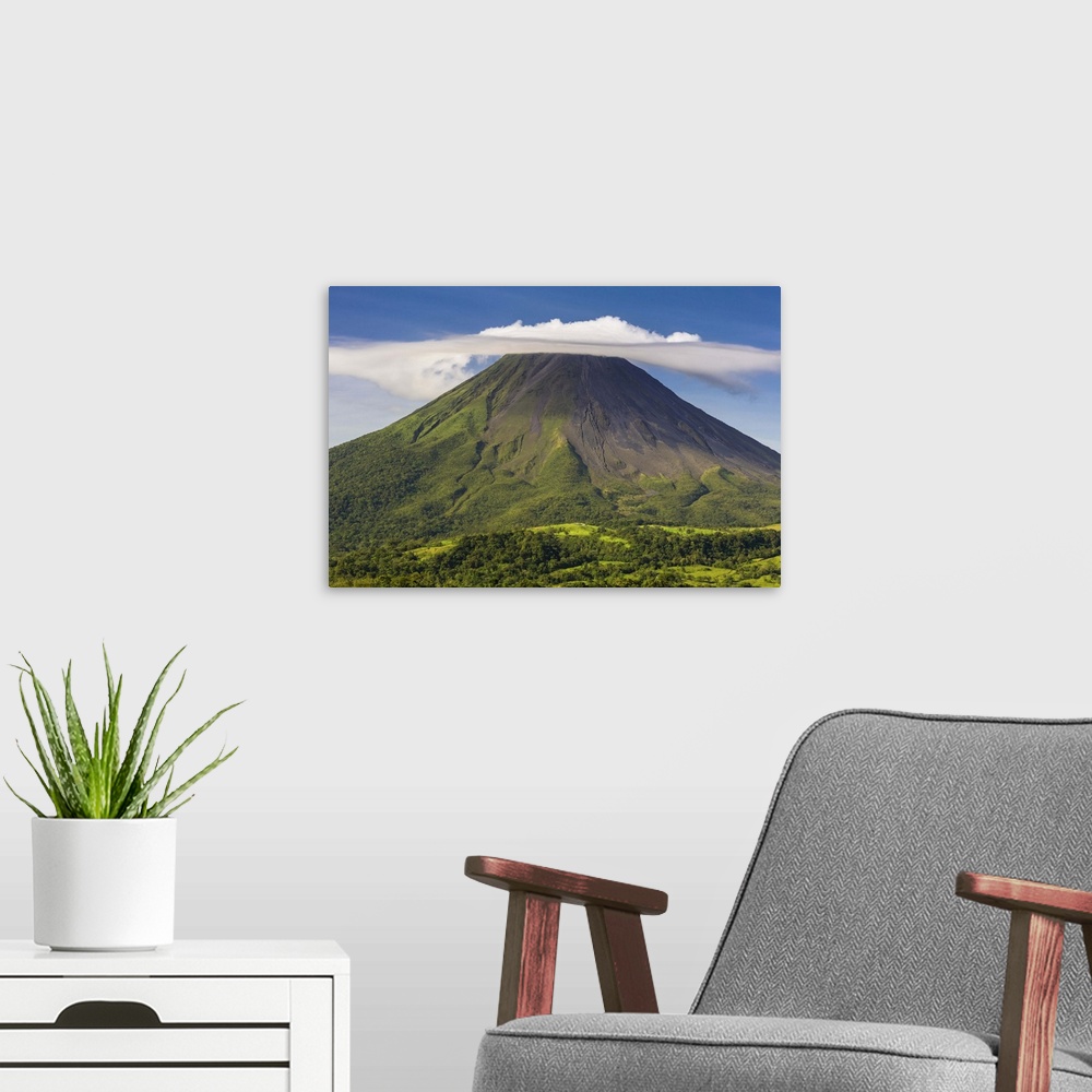 A modern room featuring Costa Rica, Alajuela, La Fortuna. The Arenal Volcano. Although classed as active the volcano has ...