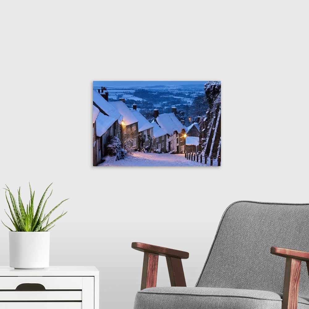 A modern room featuring Cottages on Gold Hill in winter snow, Shaftesbury, Dorset, England