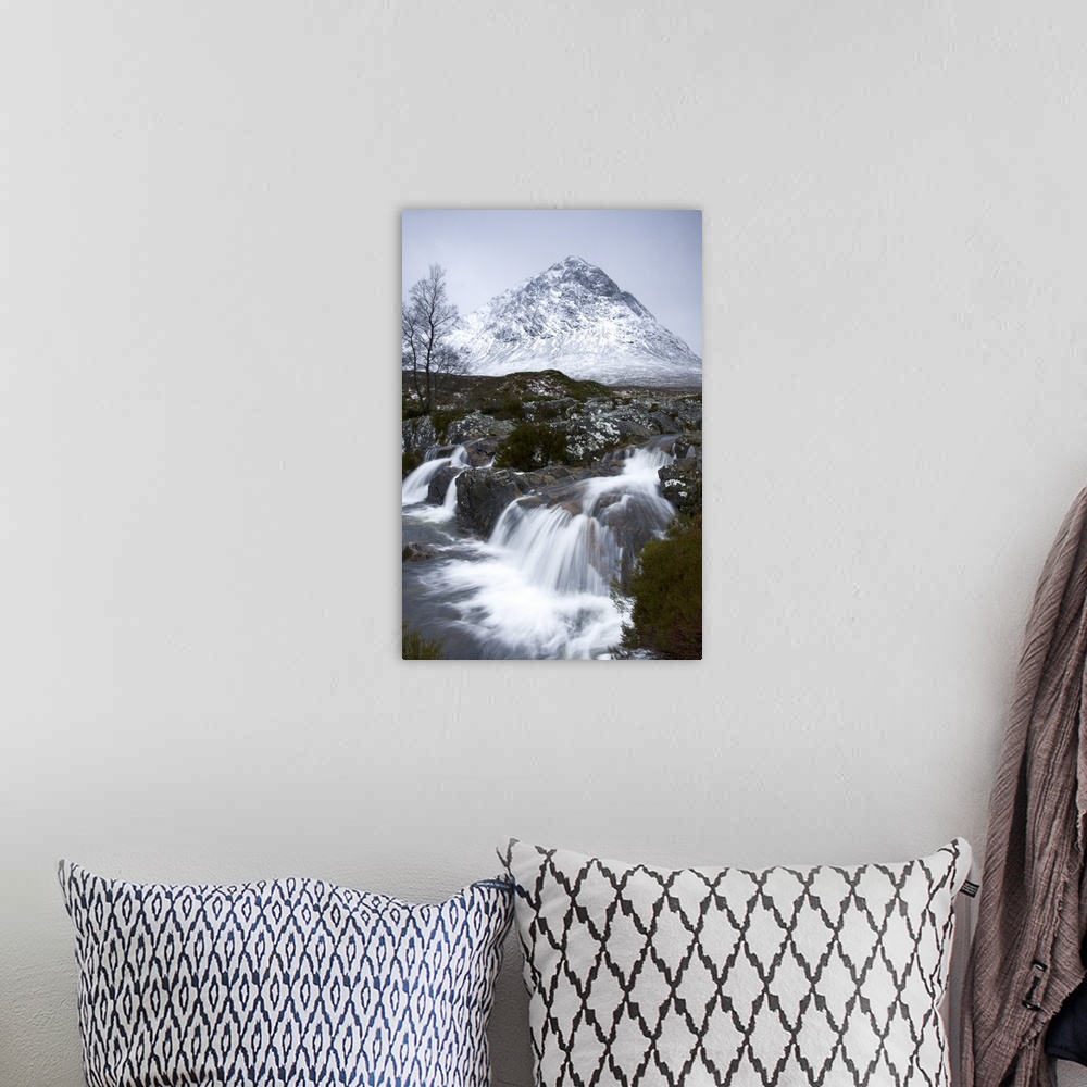 A bohemian room featuring Coupall Falls and Buachaille Etive Mor in winter, Glencoe, Scotland, UK