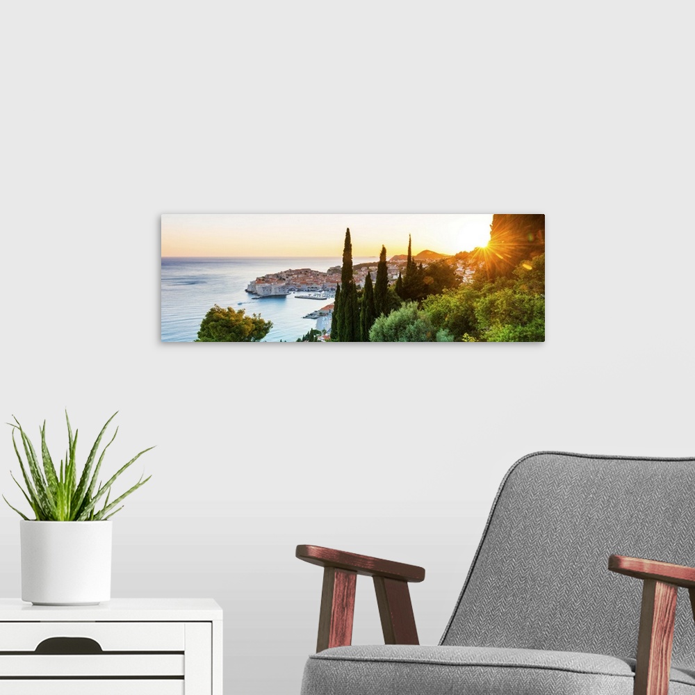 A modern room featuring Croatia, Dalmatia, Dubrovnik, Old town, view of the old town at sunset.