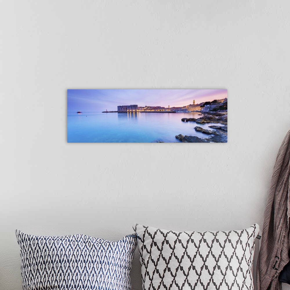 A bohemian room featuring Croatia, Dalmatia, Dubrovnik,Sunset over the old town and harbour.
