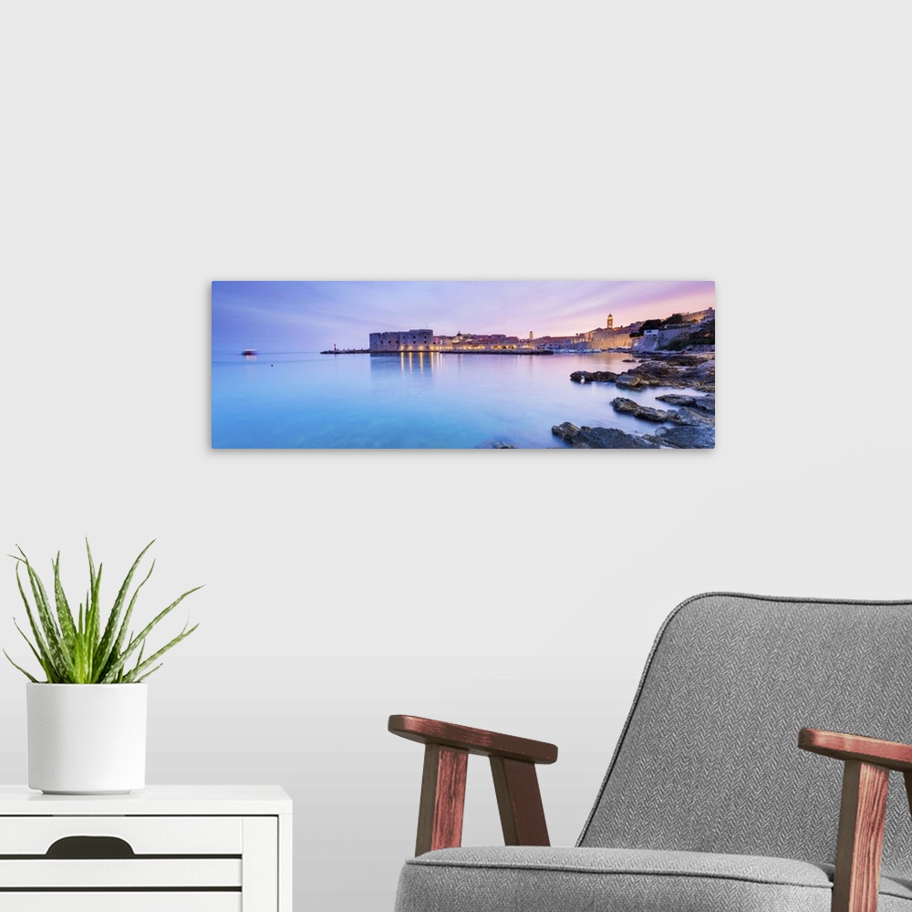 A modern room featuring Croatia, Dalmatia, Dubrovnik,Sunset over the old town and harbour.