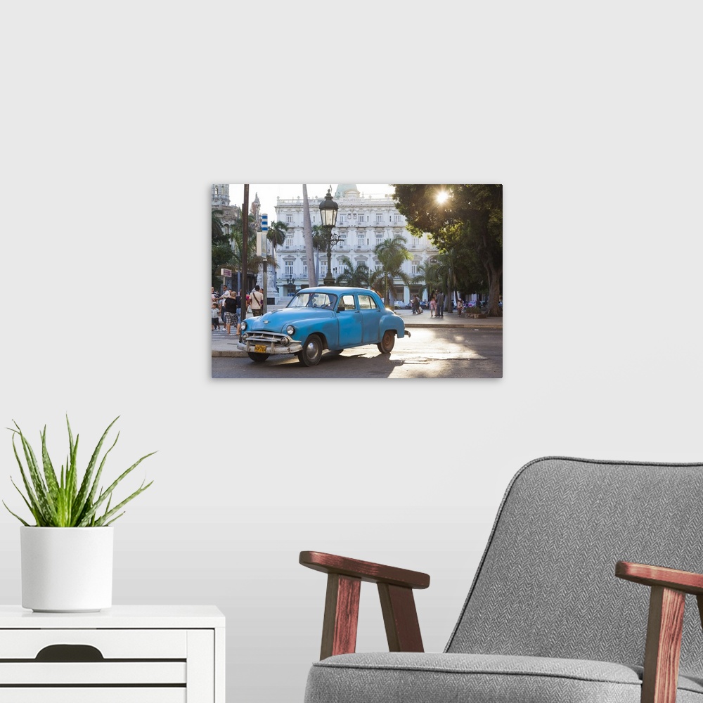 A modern room featuring Cuba, Havana, Havana Vieja, detail of 1950s-era US car