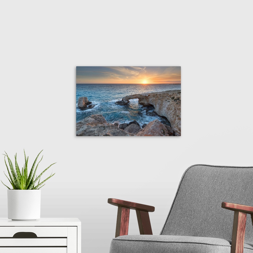 A modern room featuring Cyprus, Ayia Napa, Cape Greco, Woman Whit A White Dress At Sunset Standing Over The Love Bridge