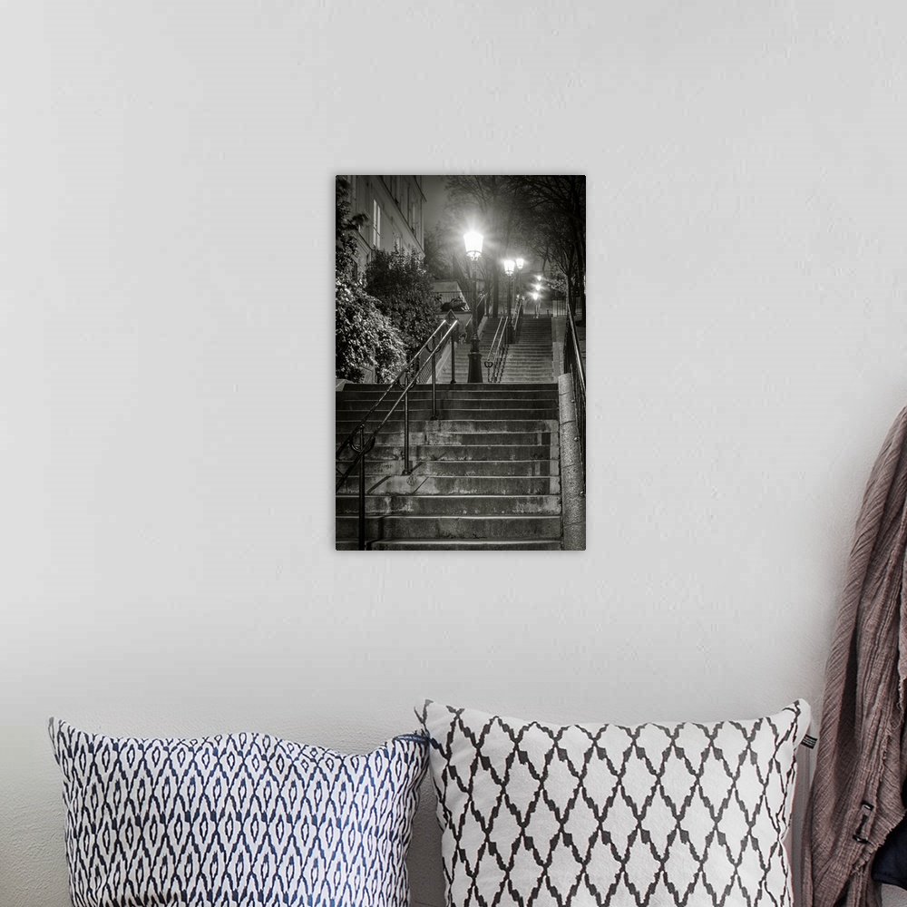 A bohemian room featuring Dark stairs at night, Montmartre, Paris, Ile-de-France, France.