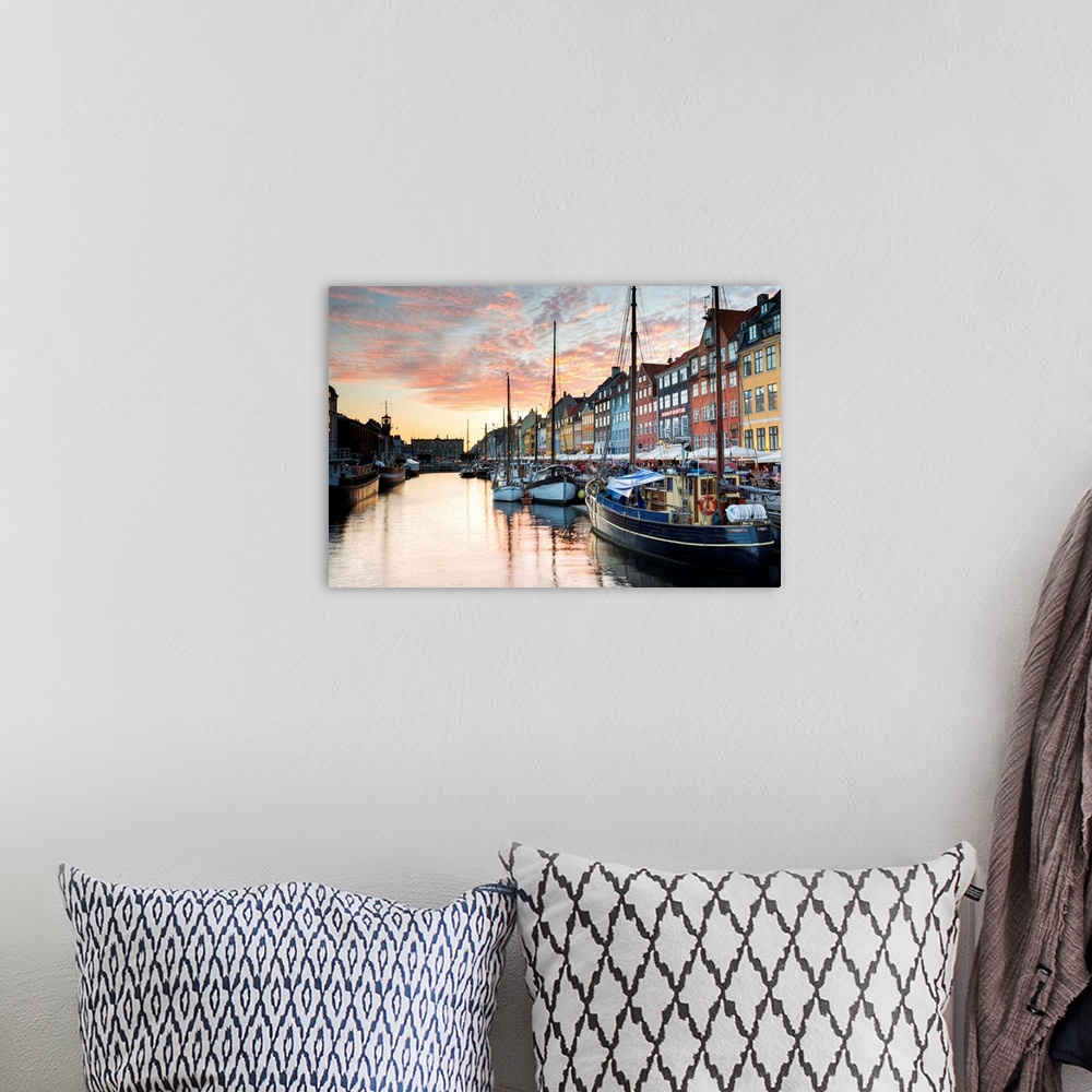 A bohemian room featuring Denmark, Hillerod, Copenhagen. Colourful buildings along the 17th century waterfront of Nyhavn at...