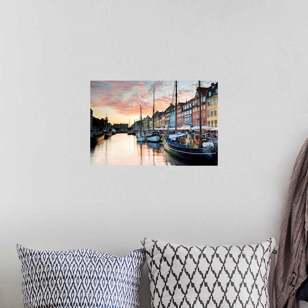 A bohemian room featuring Denmark, Hillerod, Copenhagen. Colourful buildings along the 17th century waterfront of Nyhavn at...