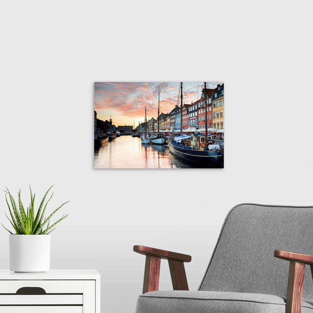 A modern room featuring Denmark, Hillerod, Copenhagen. Colourful buildings along the 17th century waterfront of Nyhavn at...