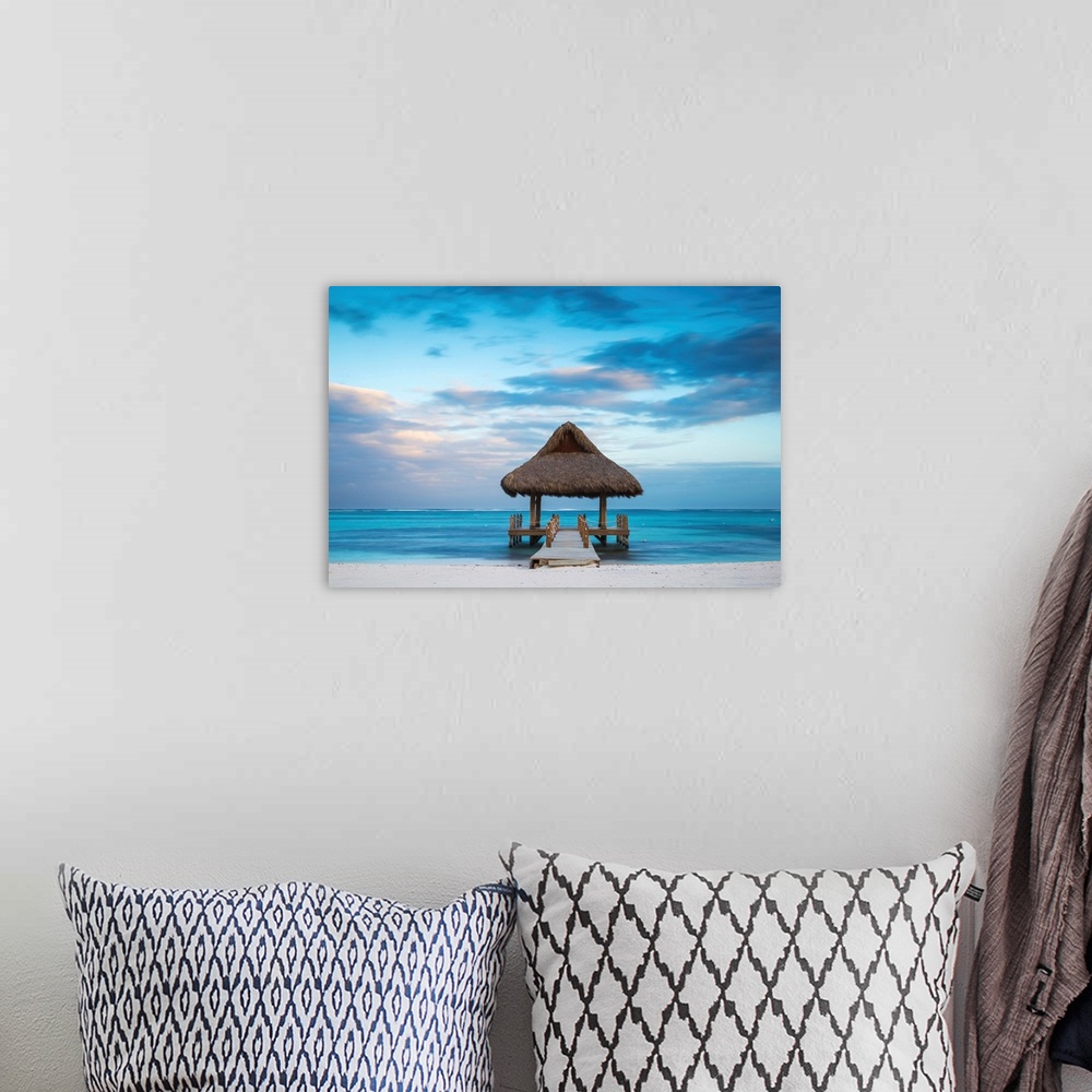 A bohemian room featuring Dominican Republic, Punta Cana, Playa Blanca, Wooden pier with thatched hut.
