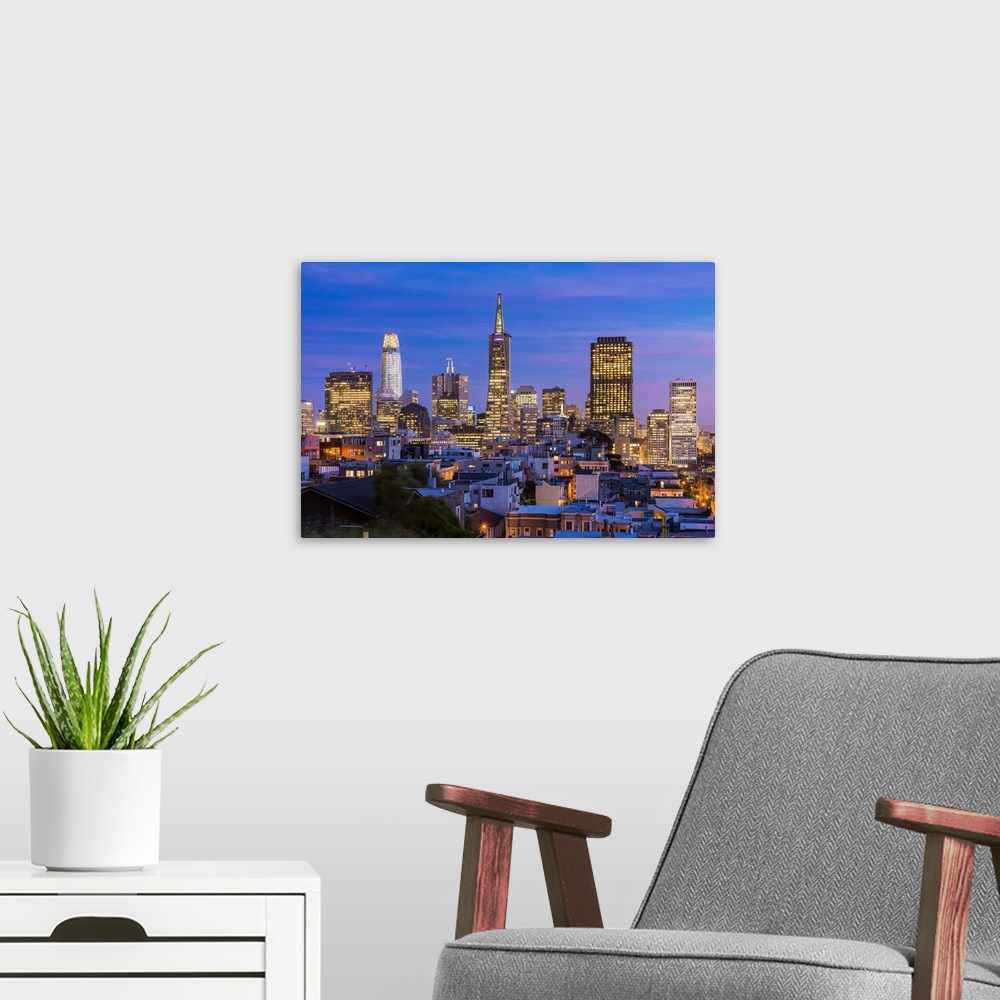 A modern room featuring Downtown skyline at dusk, San Francisco, California, USA