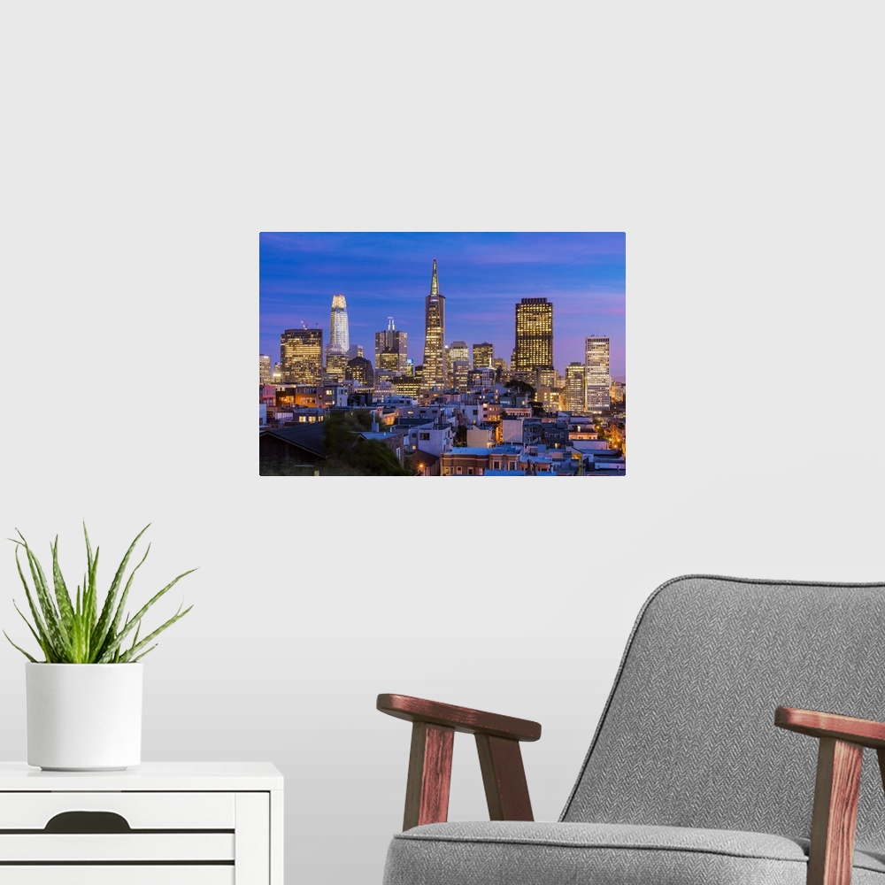 A modern room featuring Downtown skyline at dusk, San Francisco, California, USA