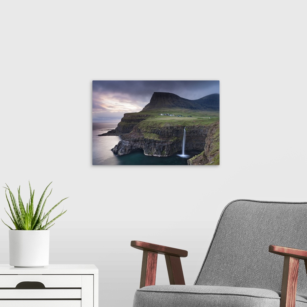 A modern room featuring Dramatic coastal scenery at Gasadalur on the island of Vagar, Faroe Islands. Spring
