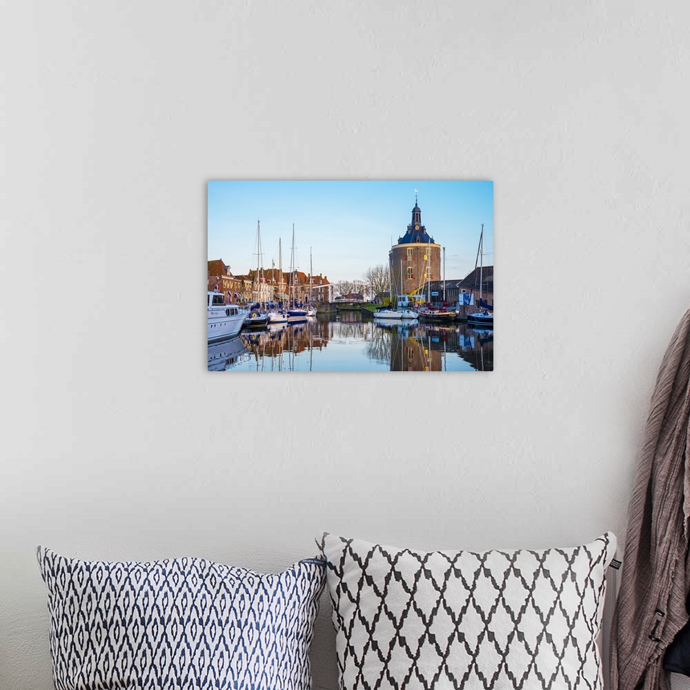 A bohemian room featuring Netherlands, North Holland, Enkhuizen. Drommedaris tower, historic former city gate at the entran...