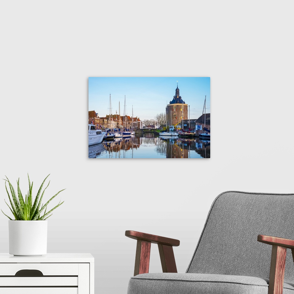 A modern room featuring Netherlands, North Holland, Enkhuizen. Drommedaris tower, historic former city gate at the entran...