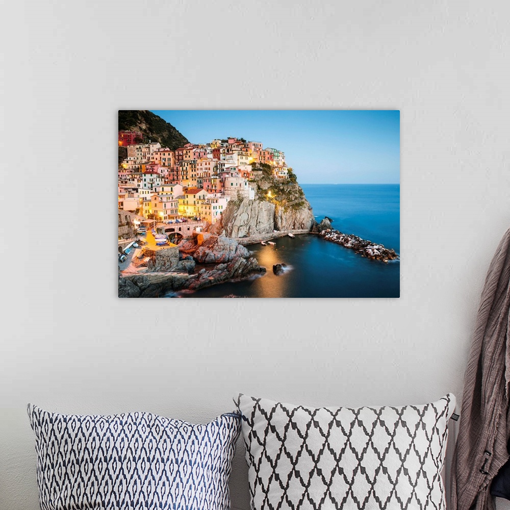 A bohemian room featuring Dusk in Manarola, Cinque Terre, Liguria, Italy