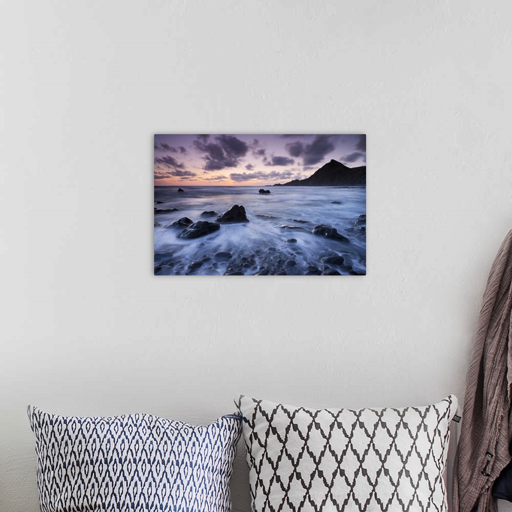 A bohemian room featuring Dusk on the rocky shores of Speke's Mill Mouth in North Devon, England. Summer