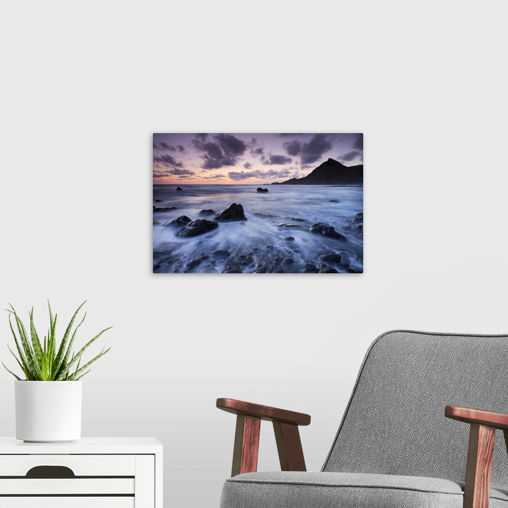 A modern room featuring Dusk on the rocky shores of Speke's Mill Mouth in North Devon, England. Summer