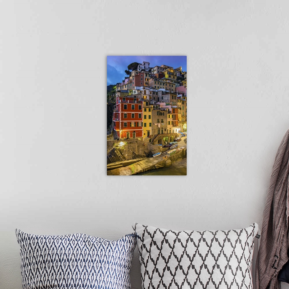 A bohemian room featuring Dusk view of the colorful sea village of Riomaggiore, Cinque Terre, Liguria, Italy