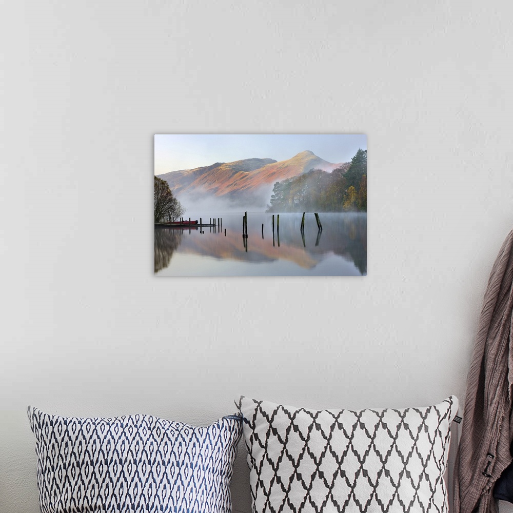A bohemian room featuring Early morning tranquil scenes of Derwent Water, with Catbells rising out of the mist in the backg...