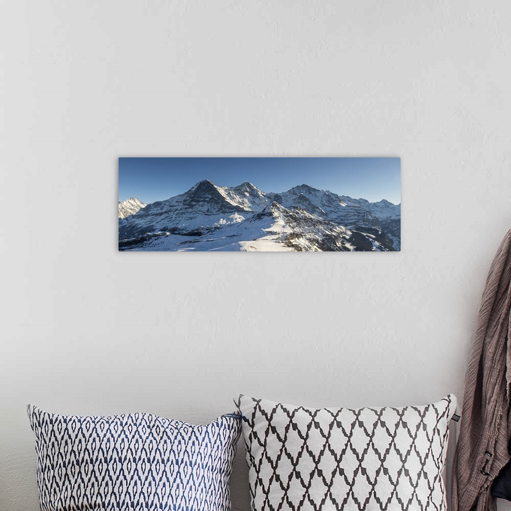 A bohemian room featuring Eger, Monch, Jungfrau from Mannlichen, Jungfrau Region, Berner Oberland, Switzerland.
