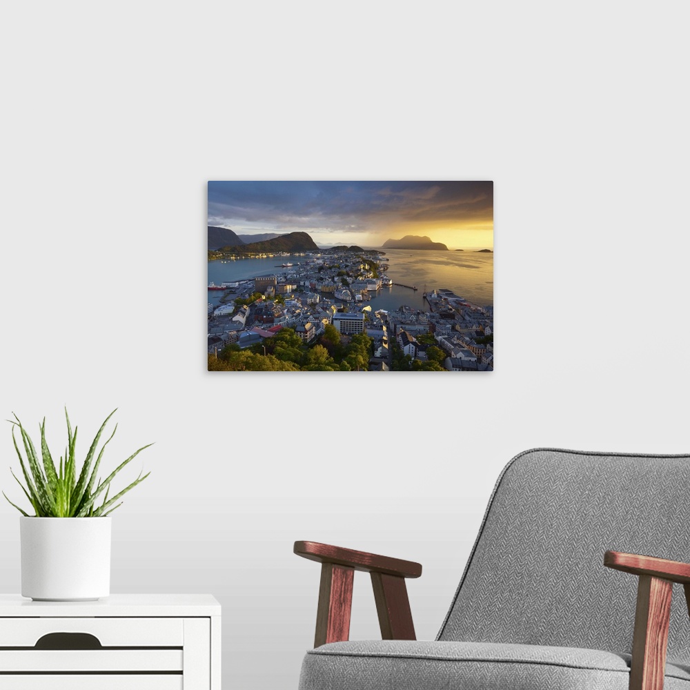 A modern room featuring Elevated view over Alesund at sunset, Sunnmore, More og Romsdal, Norway
