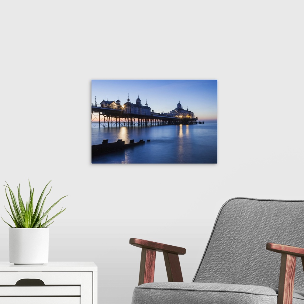 A modern room featuring England, East Sussex, Eastbourne, Eastbourne Pier at Dawn.
