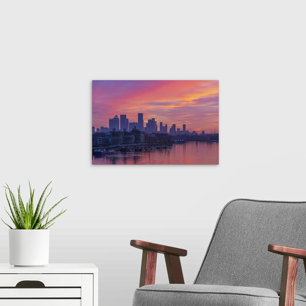 A modern room featuring England, London, Docklands, River Thames and Canary Wharf Skyline at Dawn