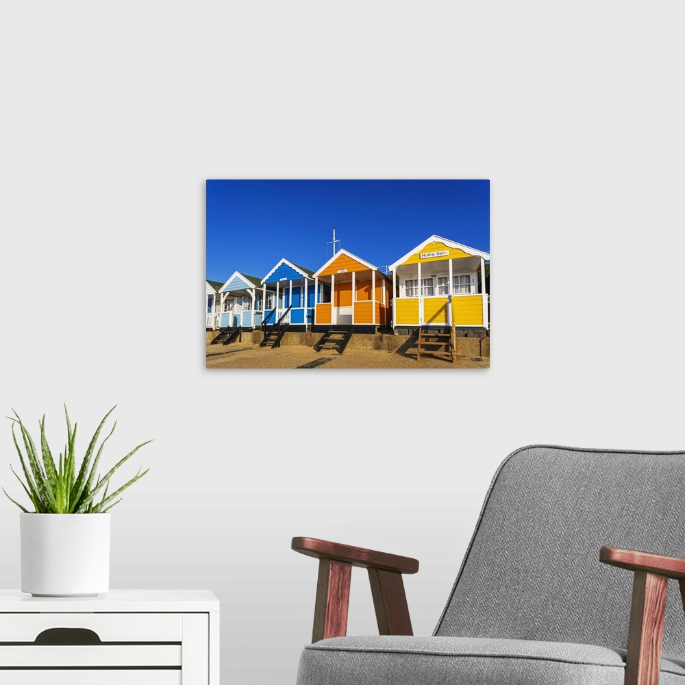 A modern room featuring England, Suffolk, Southwold, Colourful Beach Huts