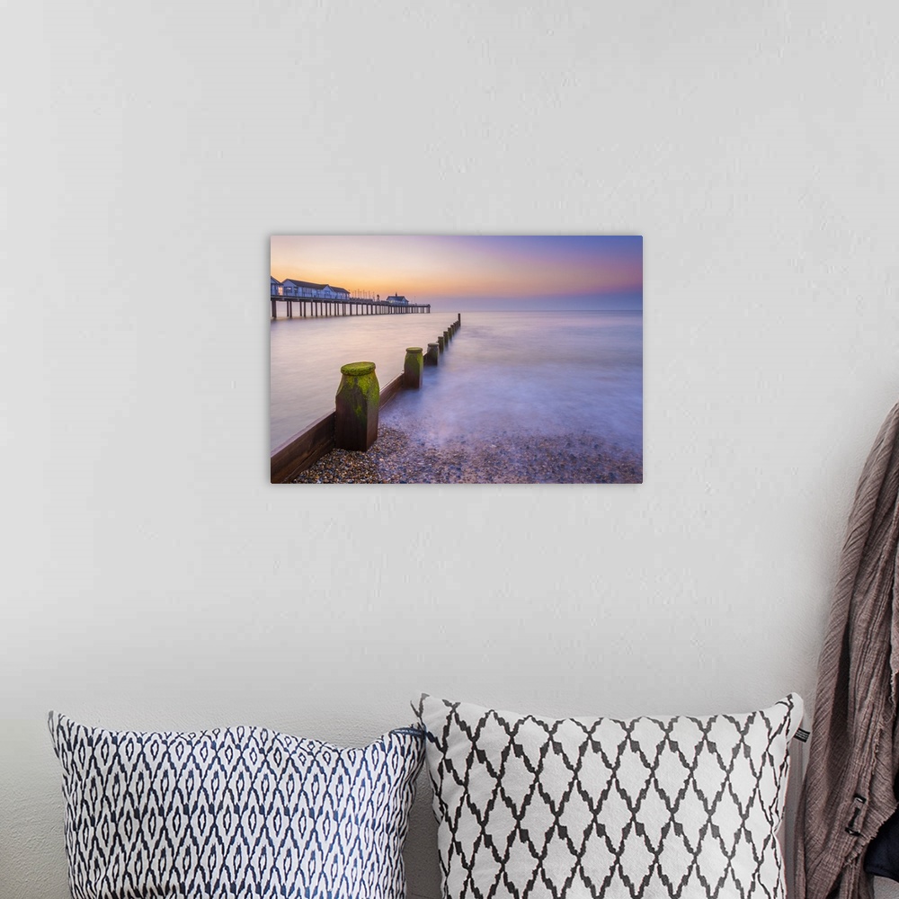 A bohemian room featuring UK, England, Suffolk, Southwold, Southwold Pier at dawn.